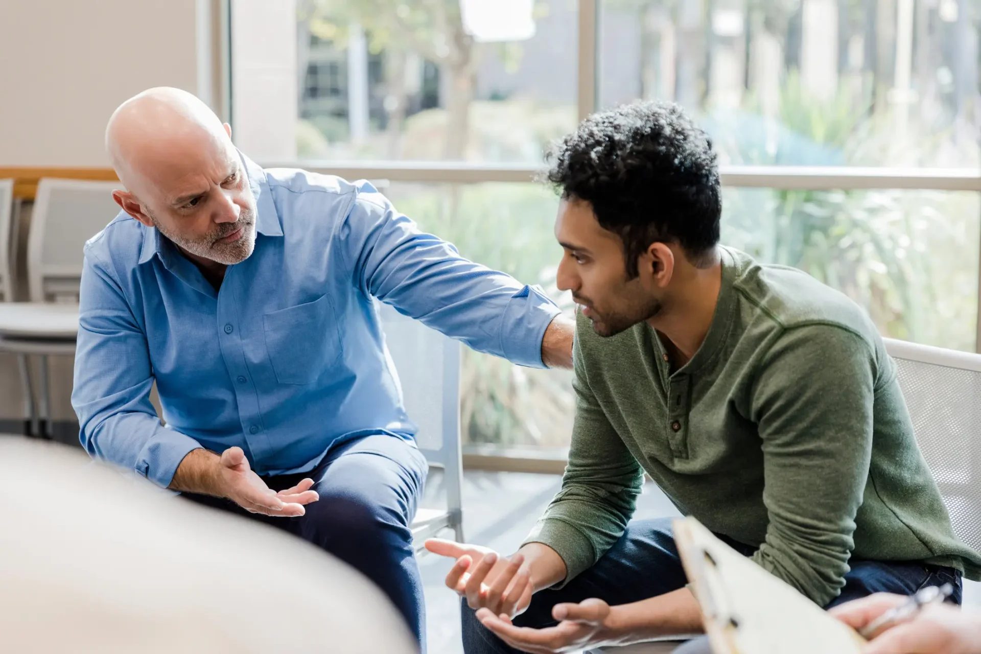 Man meeting with a therapist to treat his panic and anxiety