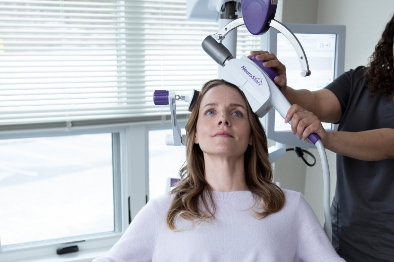 Woman Undergoing TMS Treatment